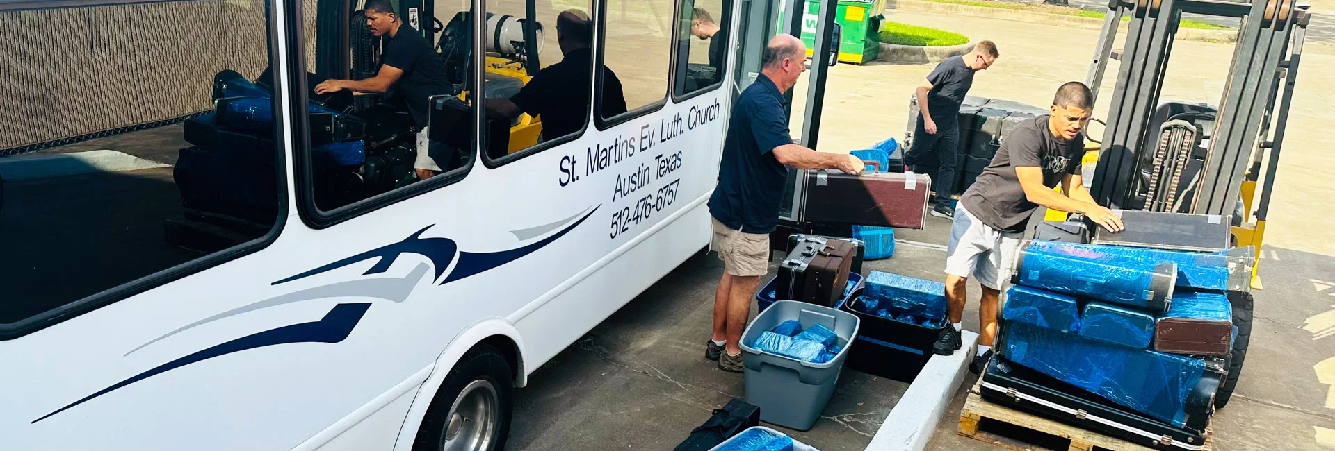 AHH volunteers load donated instruments onto a St. Martin's Ev. Lutheran Church bus en route to Houston, from where they were shipped to Juticalpa in 2024 as part of AHH's music education program, Project Noteworthy.